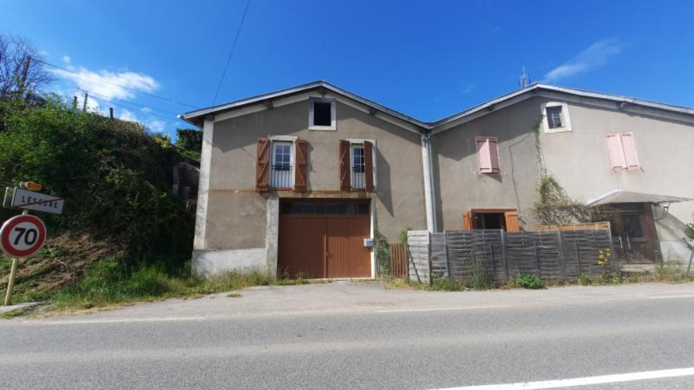Maison et appartement à Lescure